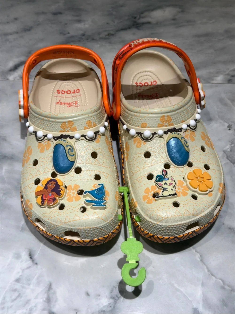 CROCS Kids Beige Orange Floral Moana Themed Clogs with Blue and orange Charms